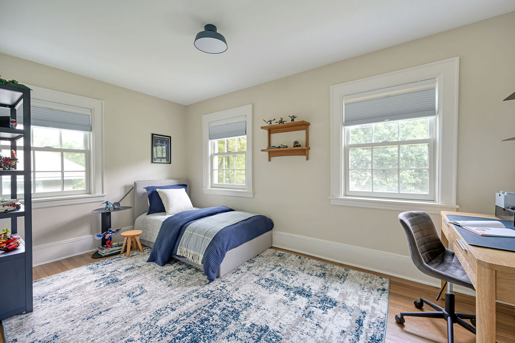 Hudson Yards Manhattan living room interior design by Orlie Katsiris Staging & Interiors featuring modern, minimalist, plush, neutral-toned furniture.