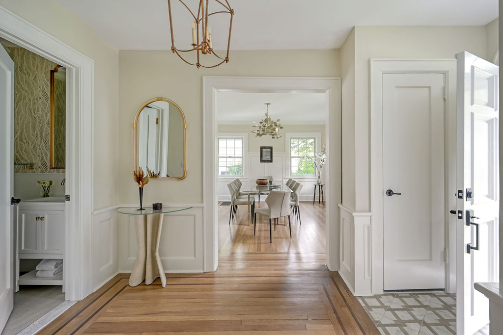 Hudson Yards Manhattan living room interior design by Orlie Katsiris Staging & Interiors featuring modern, minimalist, plush, neutral-toned furniture.