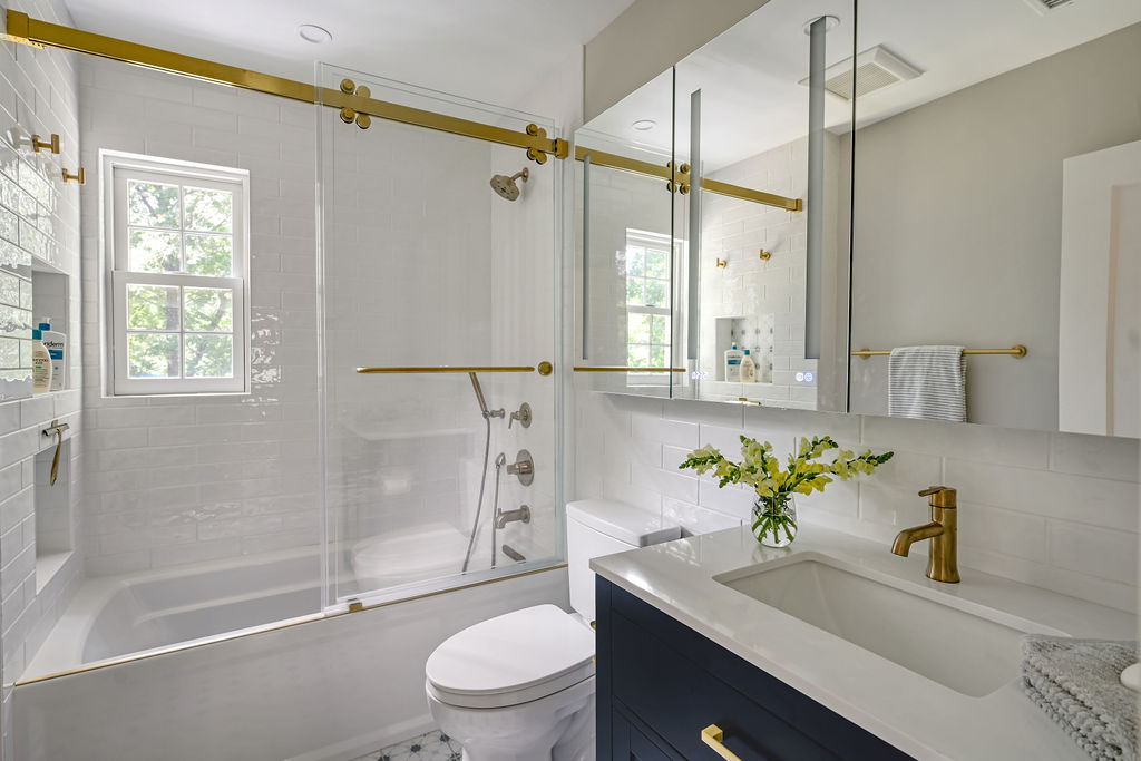 Hudson Yards Manhattan living room interior design by Orlie Katsiris Staging & Interiors featuring modern, minimalist, plush, neutral-toned furniture.