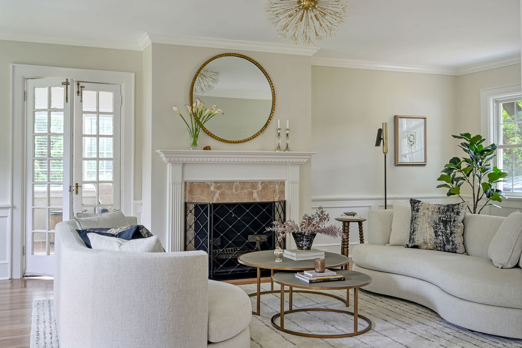 Hudson Yards Manhattan living room interior design by Orlie Katsiris Staging & Interiors featuring modern, minimalist, plush, neutral-toned furniture.