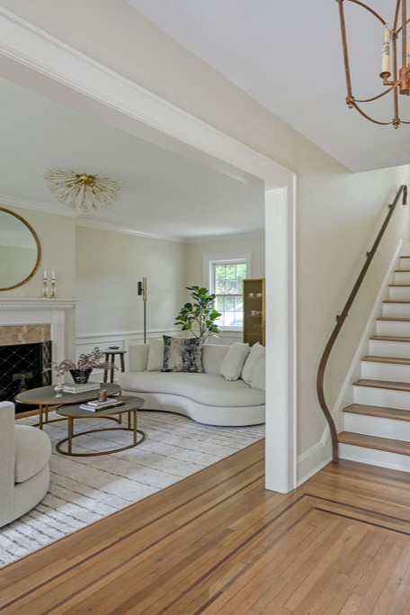 Contemporary bedroom interior design by Orlie Katsiris Staging & Interiors featuring a Forbes bed in solid white ash wood with oak veneer and a monochromatic side table.