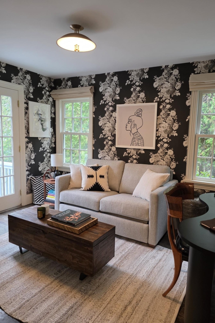 Minimalist, contemporary and urban penthouse interior home office design by Orlie Katsiris Staging & Interiors featuring modern furniture, a black standing desk, white ergonomic chair, and a gray geometric area rug