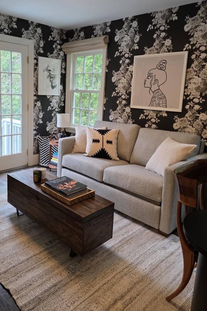 Minimalist, contemporary and urban penthouse interior home office design by Orlie Katsiris Staging & Interiors featuring modern furniture, a black standing desk, white ergonomic chair, and a gray geometric area rug