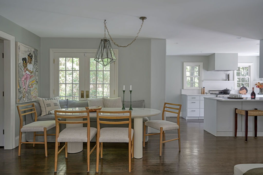 Hudson Yards Manhattan living room interior design by Orlie Katsiris Staging & Interiors featuring modern, minimalist, plush, neutral-toned furniture.