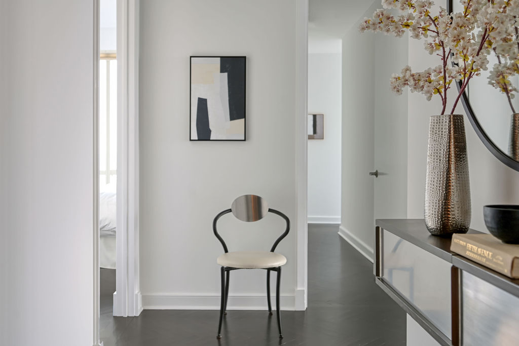 Hudson Yards Manhattan living room interior design by Orlie Katsiris Staging & Interiors featuring modern, minimalist, plush, neutral-toned furniture.