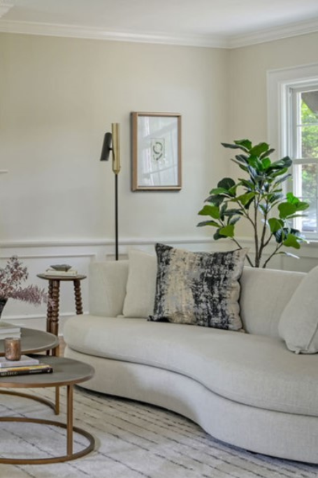Minimalist luxury penthouse dining room design by Orlie Katsiris Staging & Interiors featuring a RH Porthole Bar.